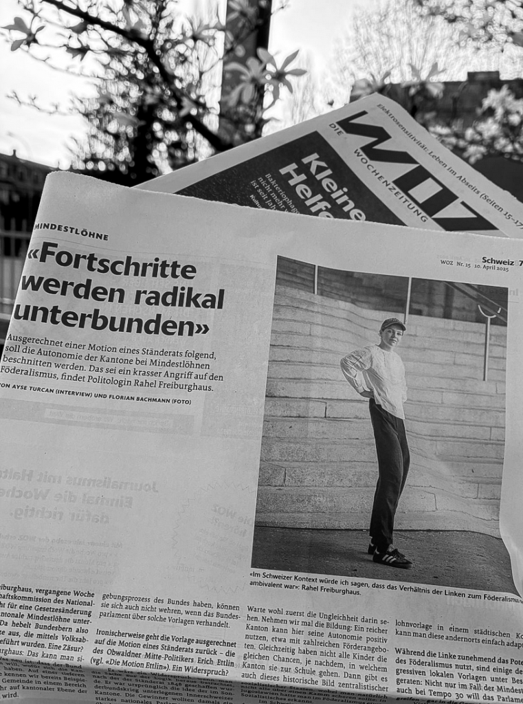 A black and white image of a newspaper article titled 'Fortschritte werden radikal unterbunden' featuring a photo of Rahel Freiburghaus. The article discusses political developments in Switzerland, framed against an outdoor background with trees.